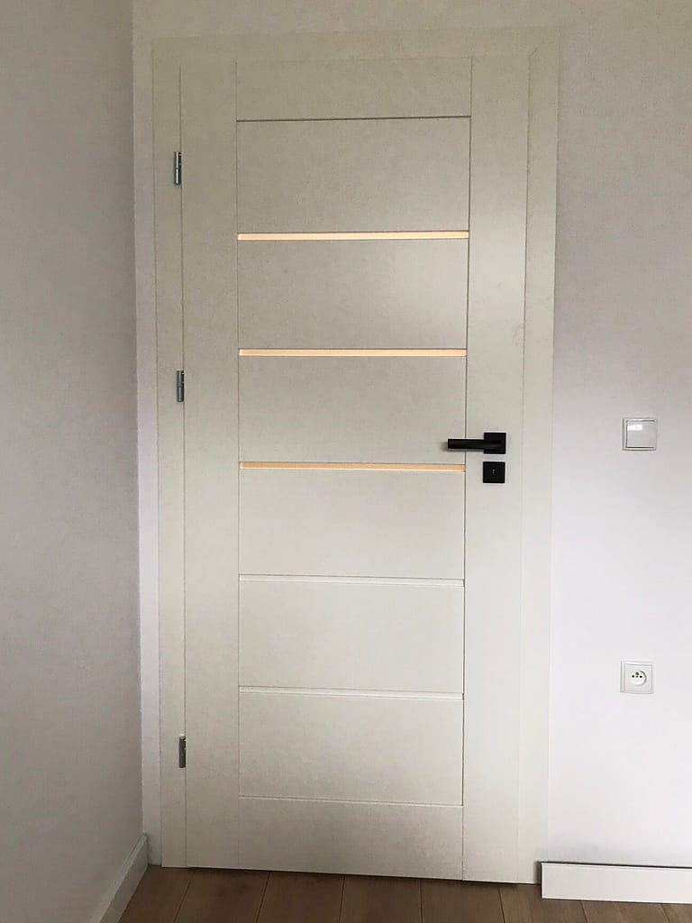 Białe drzwi Erkado - montaż FHU Tokarczyk Kraków